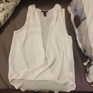 White open front sleeveless top
